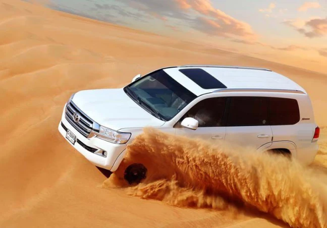 Evening Desert Safari: Red Sand Dune Bashing, Sandboarding, Camel, Entertainment & Dinner